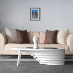 Luxury coffee table with curved wooden legs and glass top