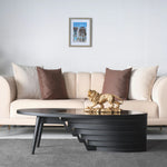 Mid-century modern coffee table featuring elliptical glass insert