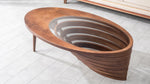 Elliptical glass center coffee table in modern living room