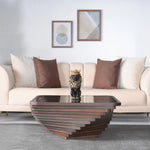 Modern living room with a beige sofa, decorative pillows, and a wooden coffee table.