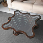 Artistic centerpiece table with floral silhouette and stacked base
