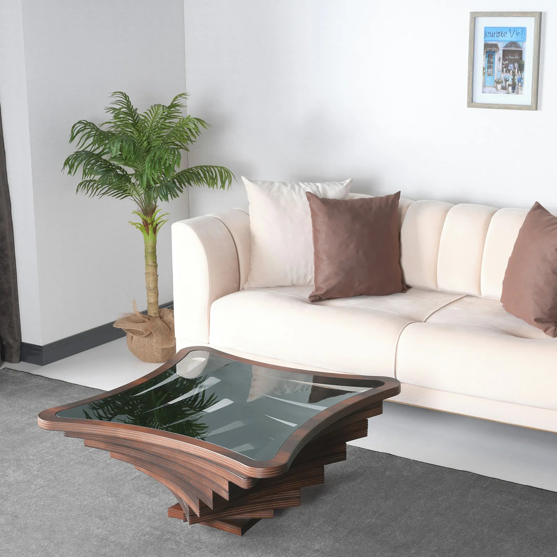 Angular layered coffee table with square transparent surface