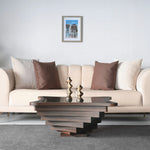 Sculpted wood and glass table for contemporary interiors