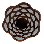 Intricate lattice coffee table with sculpted floral wave base
