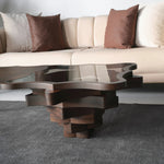 Sculptural side table with geometric wood carving detail