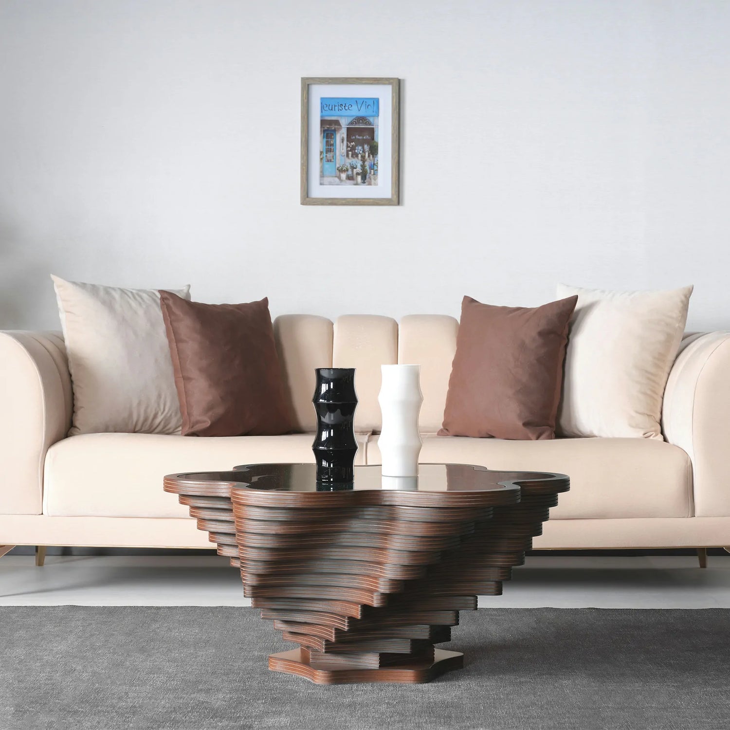 Glass top coffee table with layered wooden flower design