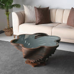 Petal-shaped coffee table with floral sculptural base