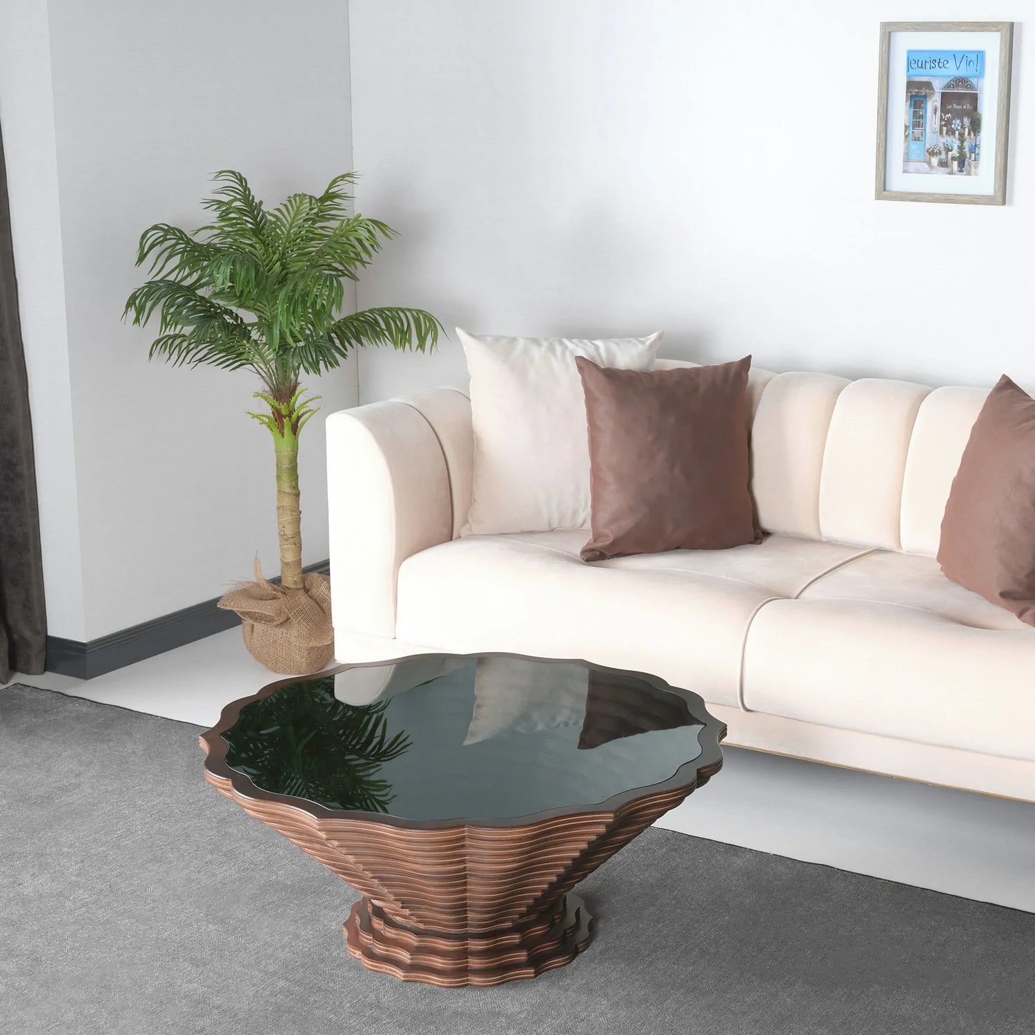 Scalloped round coffee table with rippled wood base