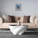 Modern vortex coffee table with curved layered form
