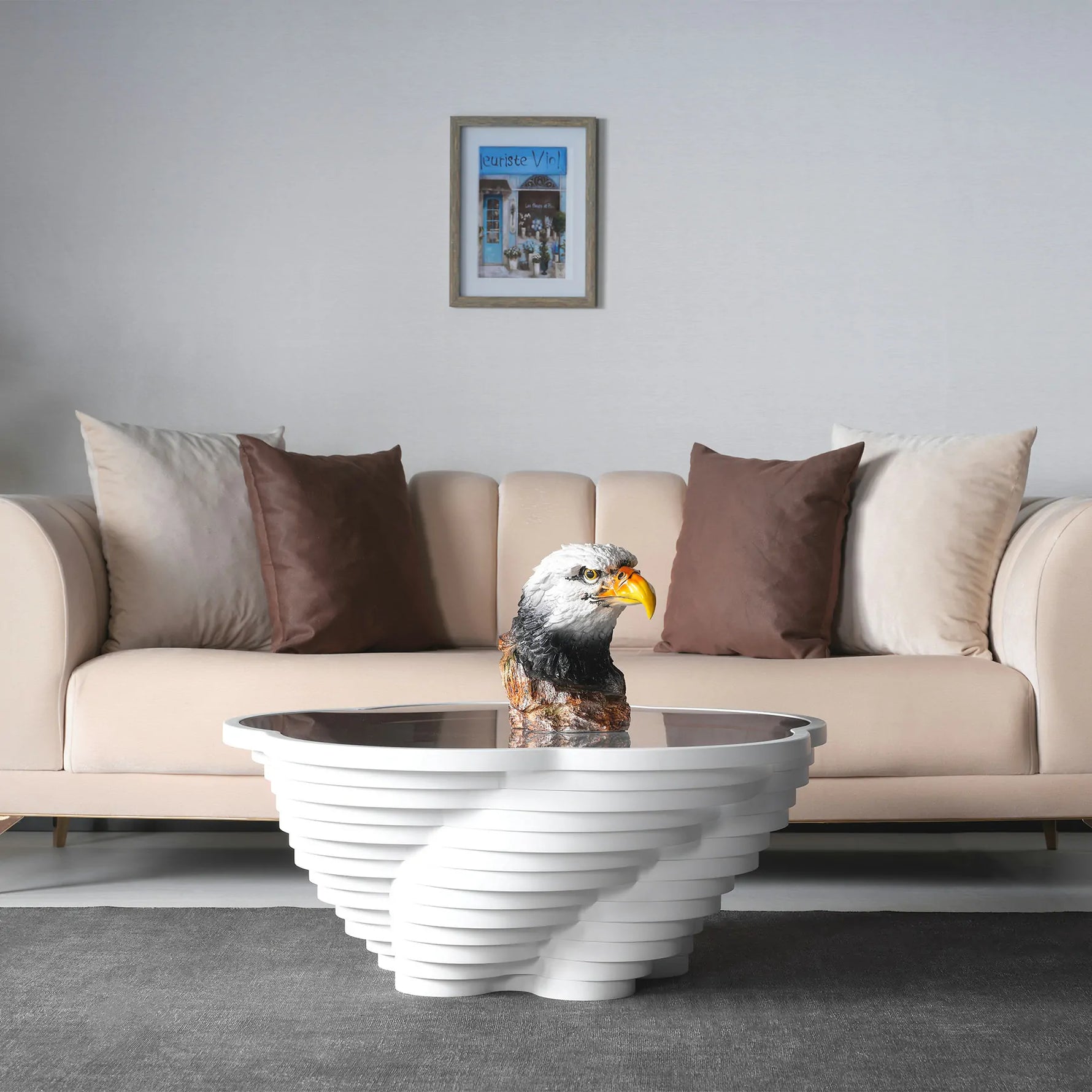 Minimalist white table with spiral interior under glass