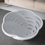 Cloud-edge white coffee table with glass top centerpiece