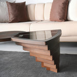 Dual-level artistic coffee table with architectural base